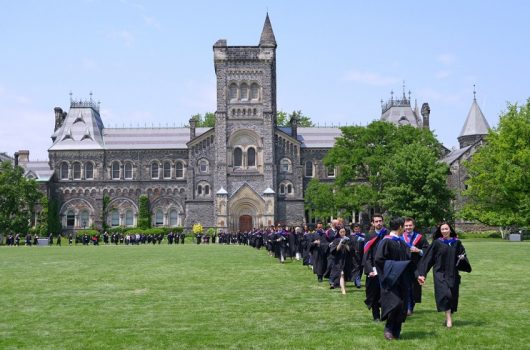 Toronto, Canada - June 7, 2018:  Graduates of the Faculty of Medicine at the University of Toronto march in a procession across campus to receive their diplomas.
